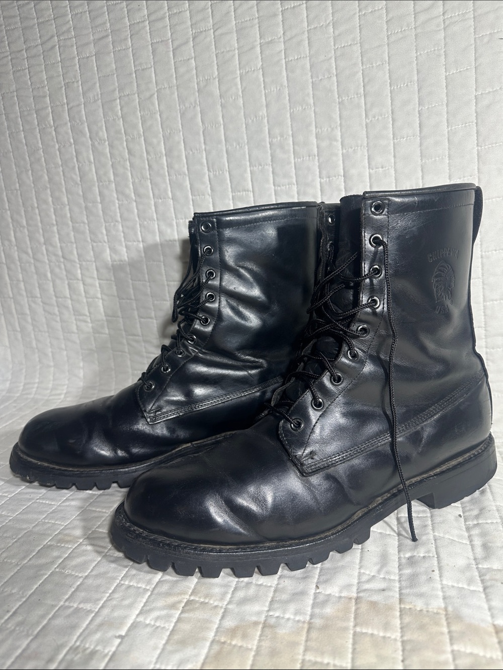 Chippewa boots Vintage lace-up design, black leather & Indian head logo.